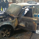поджог полицейского автомобиля: сгоревшая машина